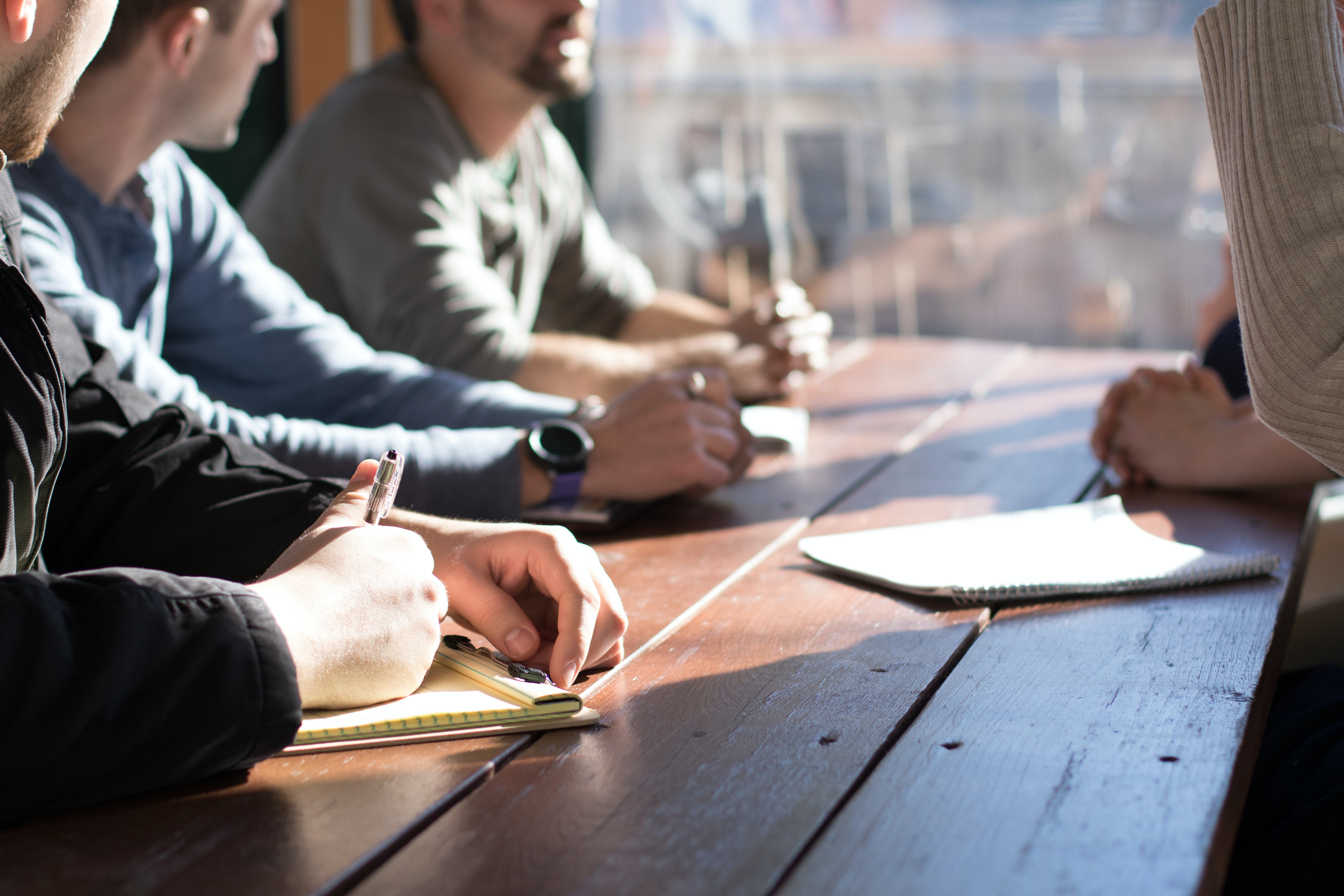 People sitting at a conference table